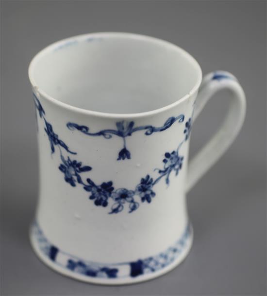 A very rare Worcester blue and white Floral Swag, Ribbon and Scroll pattern coffee can, c.1755, two rim chips with short hairline crack